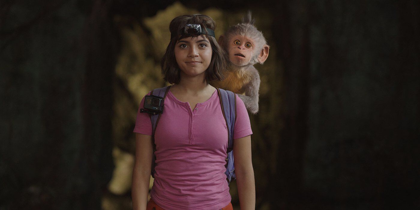 Isabela Merced as Dora wearing a GoPro on her head with Boots on her back in 'Dora and the Lost City of Gold' (2019)