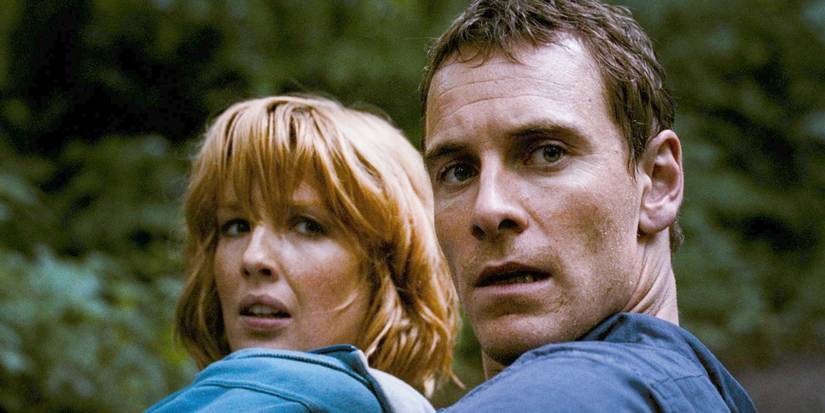 Michael Fassbender as Steve and Kelly Reilly as Jenny in the woods in Eden Lake