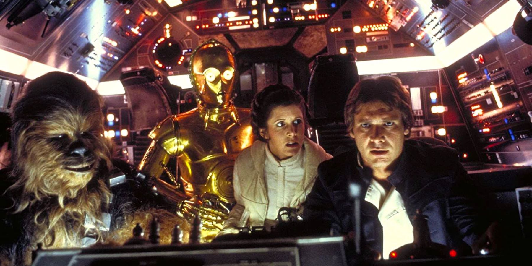 Chewbacca, C-3PO, Princess Leia, and Han Solo man the cockpit in Star Wars: Episode V - The Empire Strikes Back.