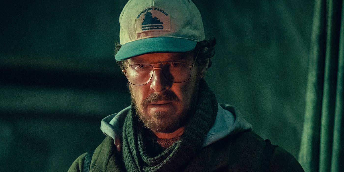 Benedict Cumberbatch in a baseball cap, glasses and beard in Netflix's Eric