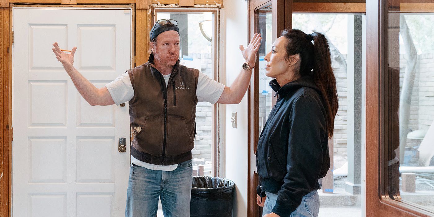 Chip and Joanna Gaines at the entrance to their new project on Fixer Upper: The Lakehouse