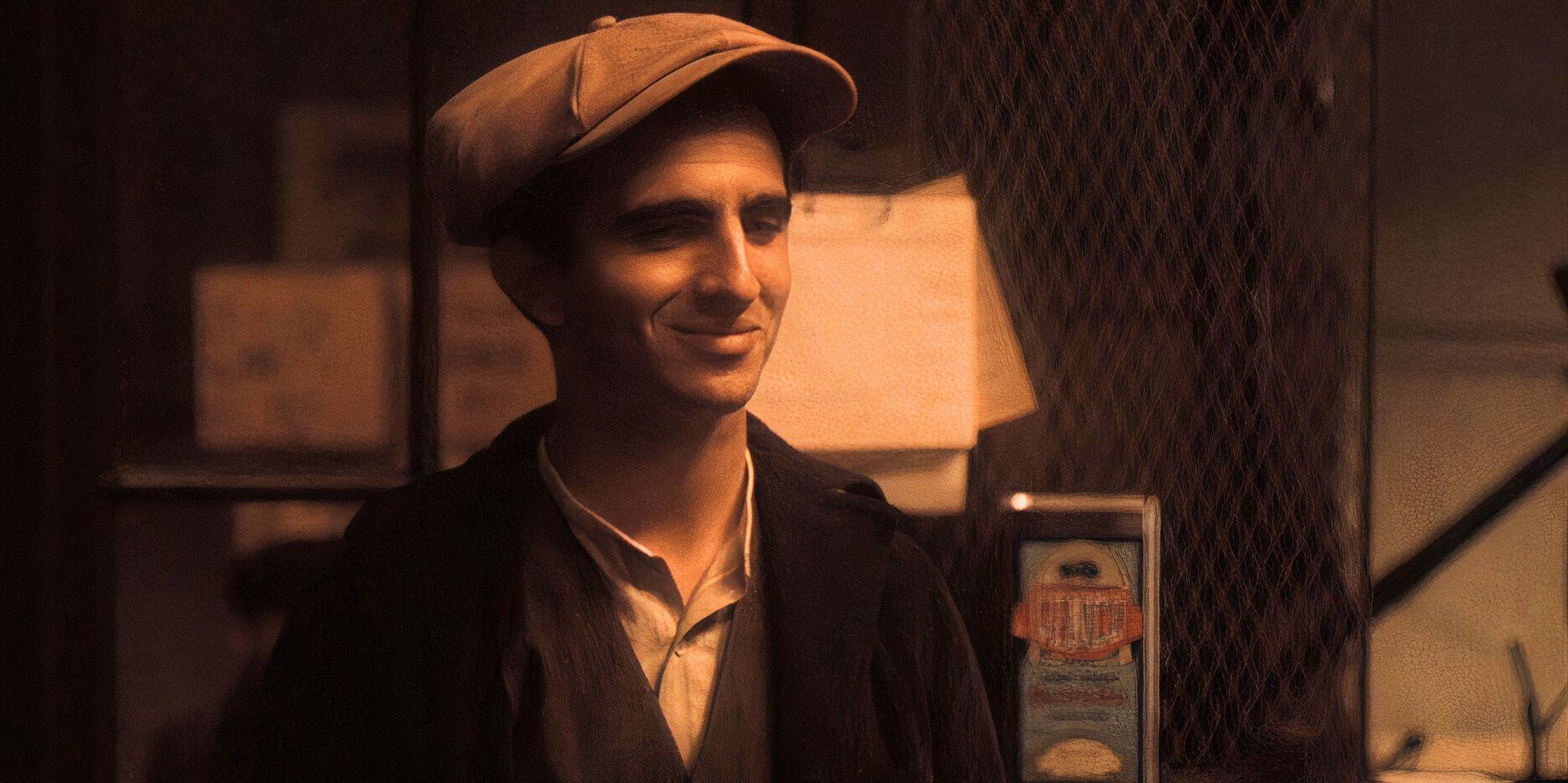 Genco Abbandando smiling at someone off-camera in The Godfather: Part II (1974)
