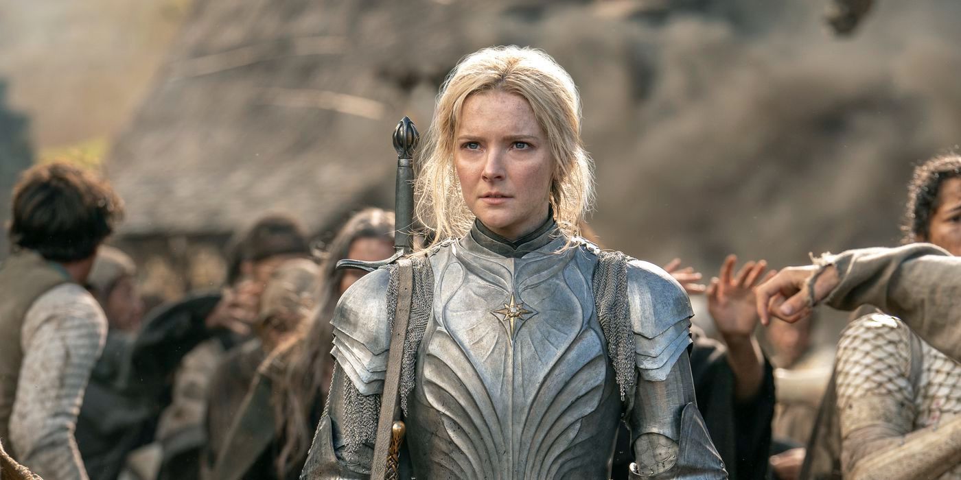 Galadriel wearing a suit of armor standing in a crowd in 'Lord of the Rings: Rings of Power.'