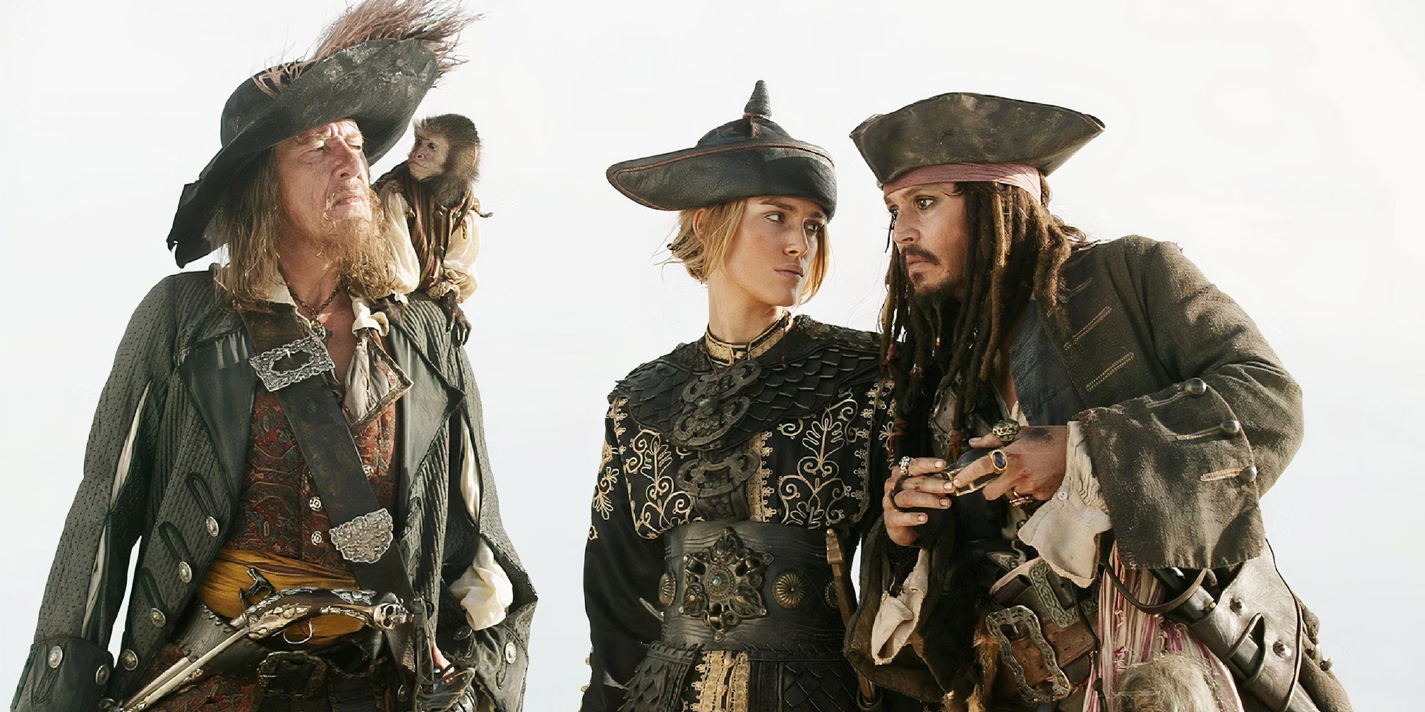 Captain Barbossa, Jack Sparrow, and Elizabeth Swann talking in Pirates of the Caribbean At World's End