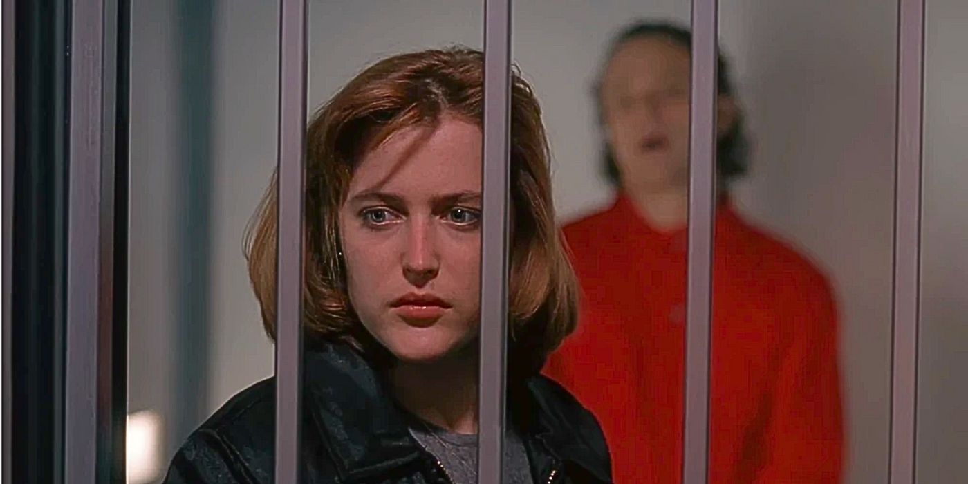 Gillian Anderson tearfully turns away from death row inmate Brad Dourif from episode Beyond the Sea in the X-Files