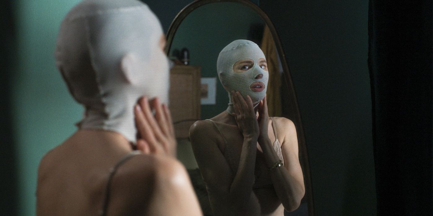 A woman with bandages in her face looking in the mirror in Goodnight Mommy