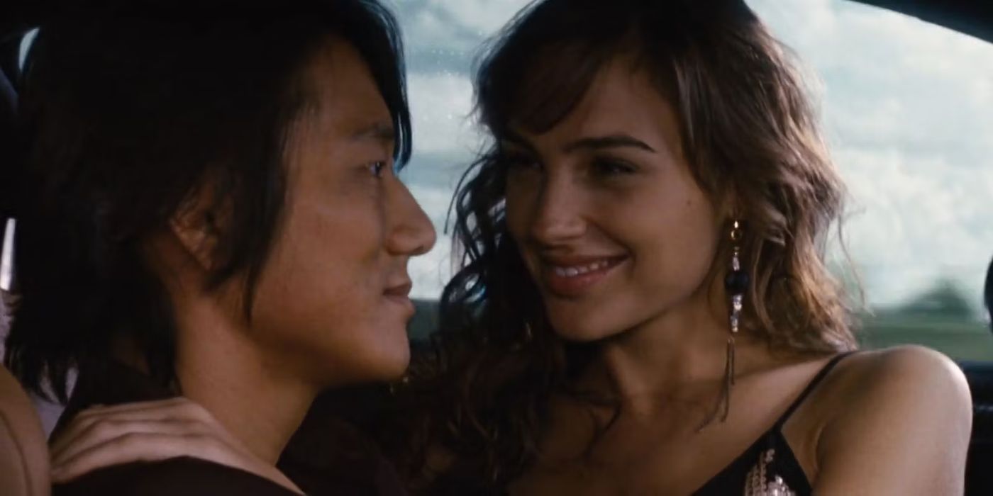 Han (Sung Kang) and Gisele (Gal Gadot) in Fast Five