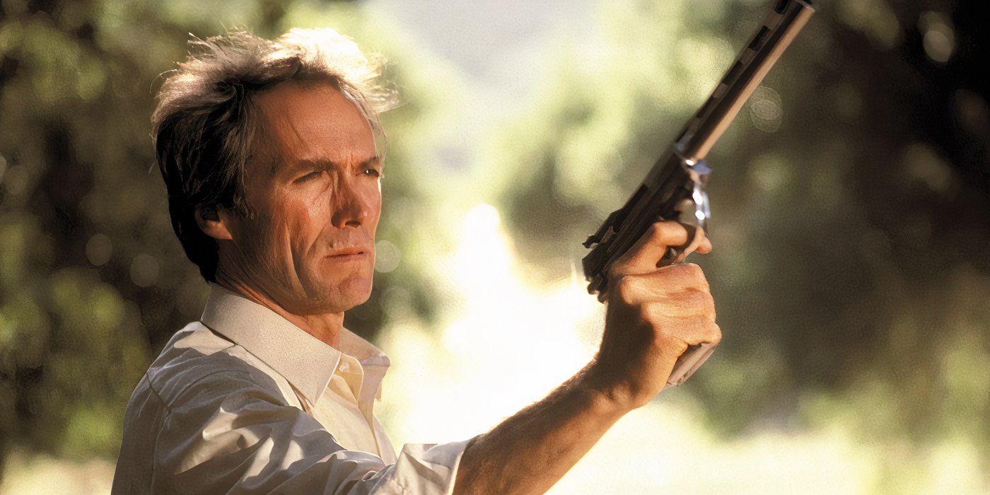 "Dirty Harry" Callahan (Clint Eastwood) holds his gun high as he looks at it in 'Sudden Impact'