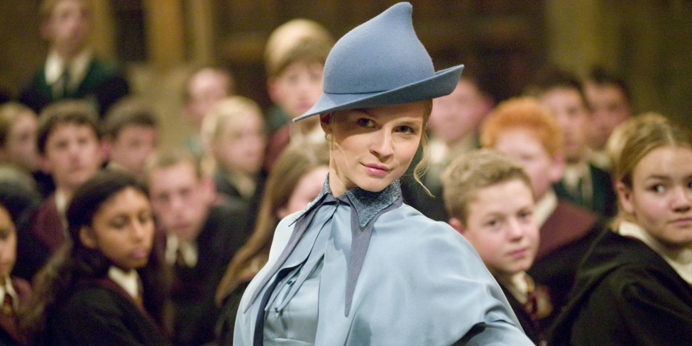 Fleur Delacour smiling while at the Hogwarts Great Hall in Harry Potter and the Goblet of Fire