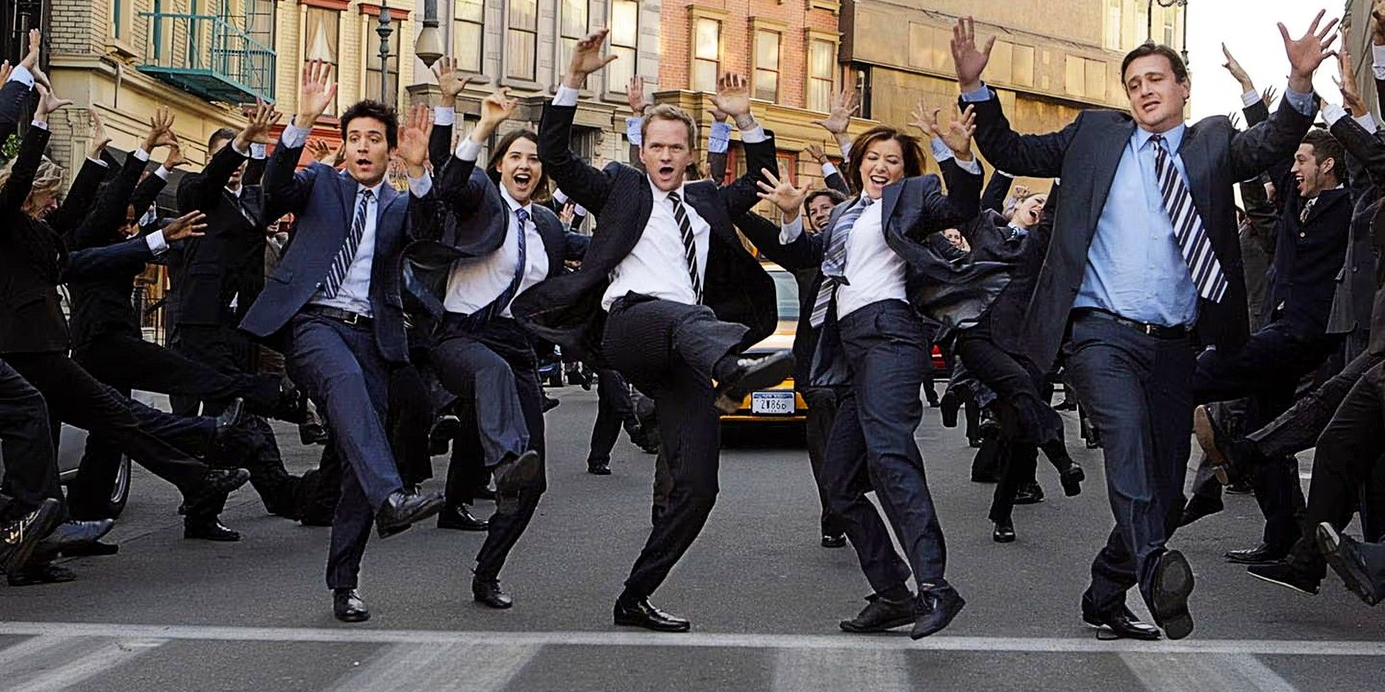 Ted Mosby, Robin Scherbatsky, Barney Stinson, Lily Aldrin, and Marshall Erikson dancing in suits in 