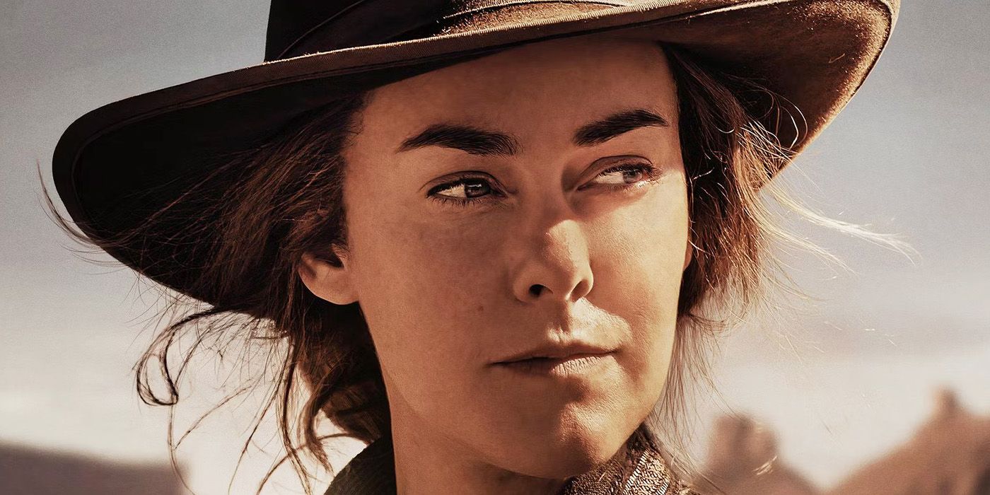 A close-up of Jena Malone as Lucy Harvey in a cowboy hat looking off to the side
