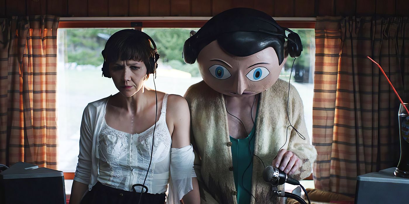 Frank and Clara with headphones listening to Frank's music 