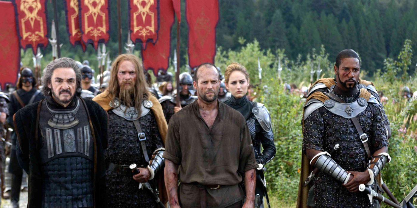 The Farmer standing in the front of a group of soldiers In The Name of the King