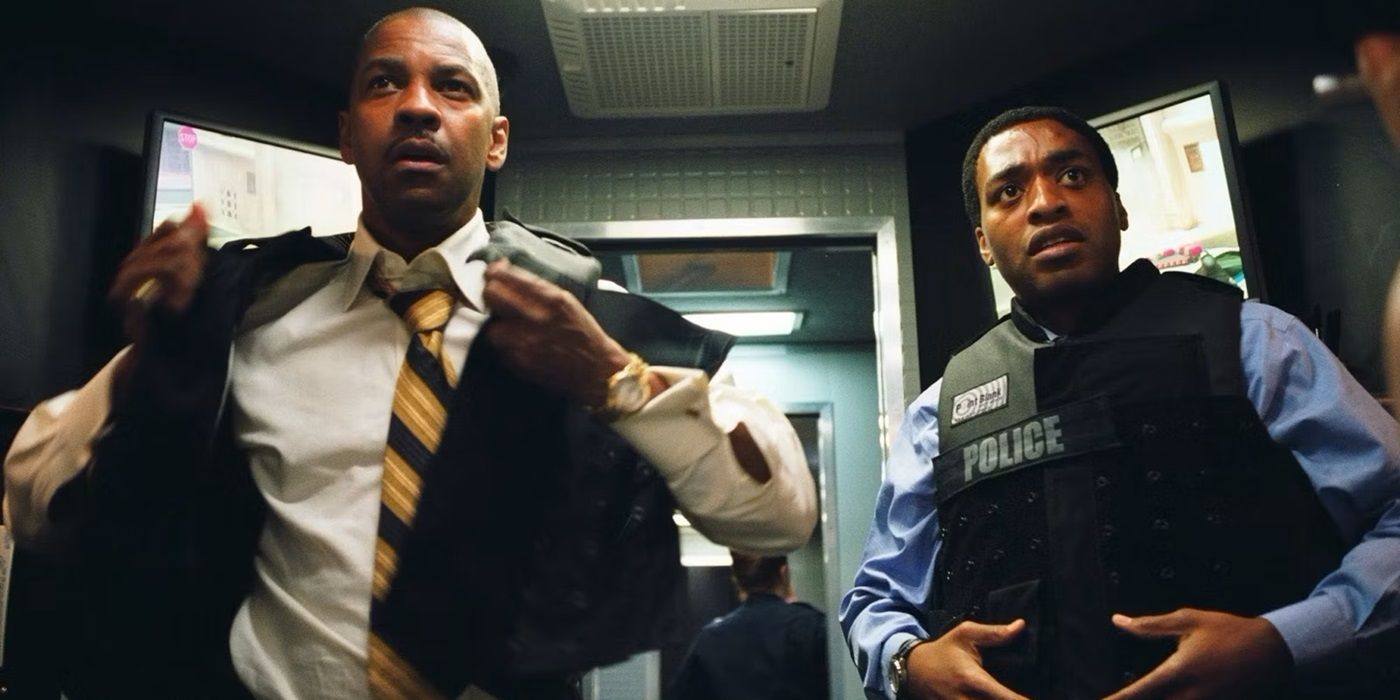 Denzel Washington and Chiwetel Ejiofor inside an armored van in Inside Man (2006)