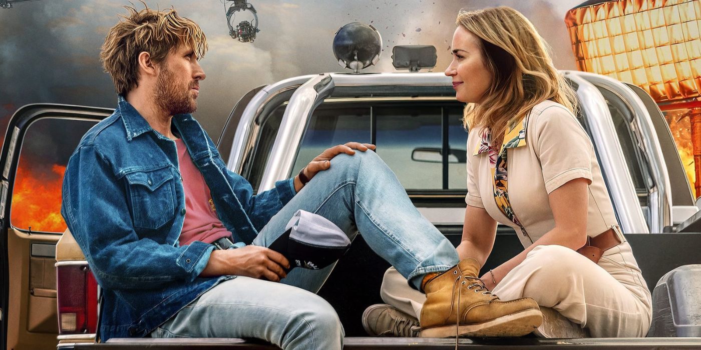 Image from THE FALL GUY showing Ryan Gosling (left) and Emily Blunt (right) sitting in the back of a pickup truck. 