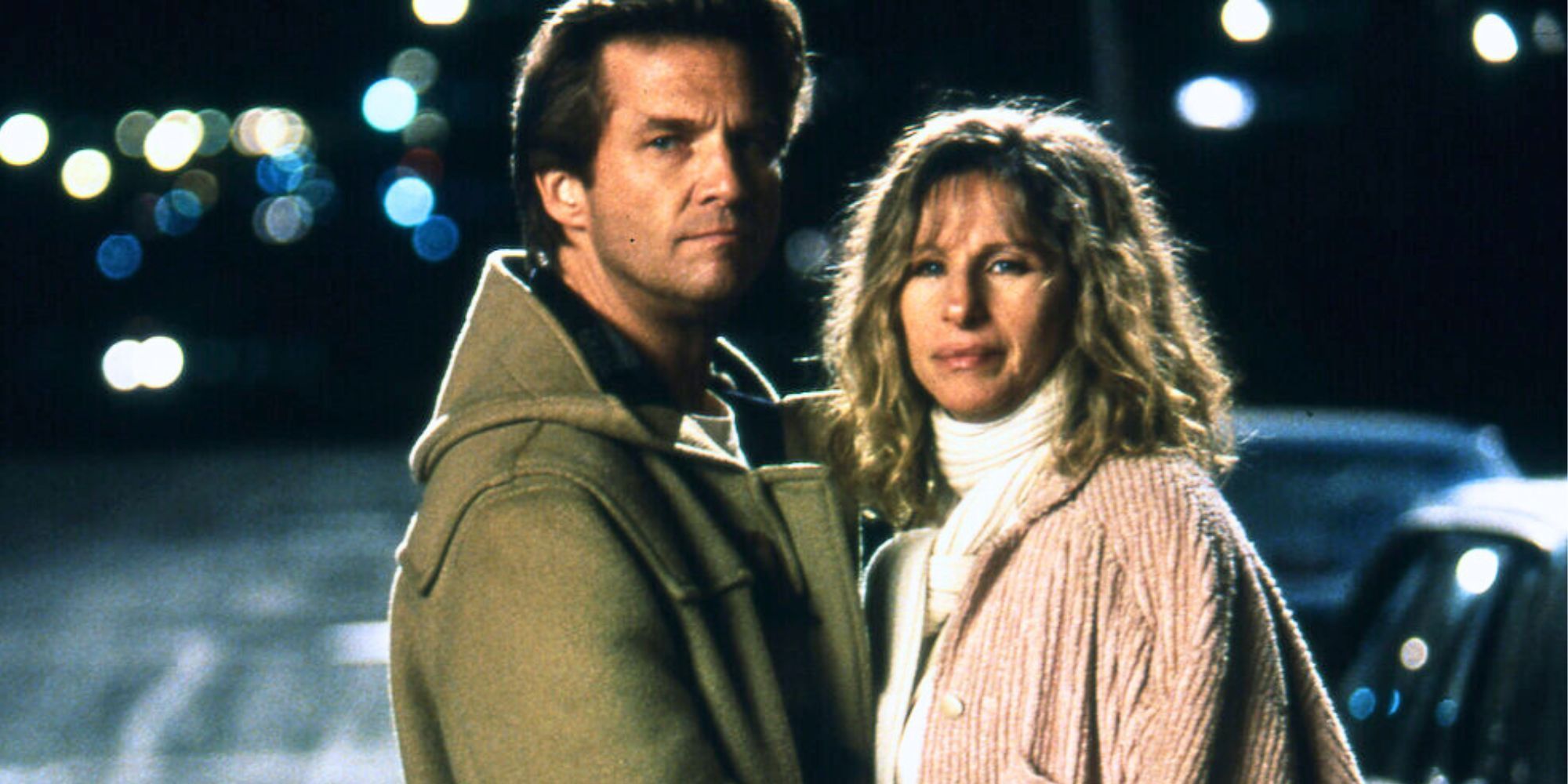 Jeff Bridges and Barbra Streisand standing in the street together in The Mirror Has Two Faces (1996)