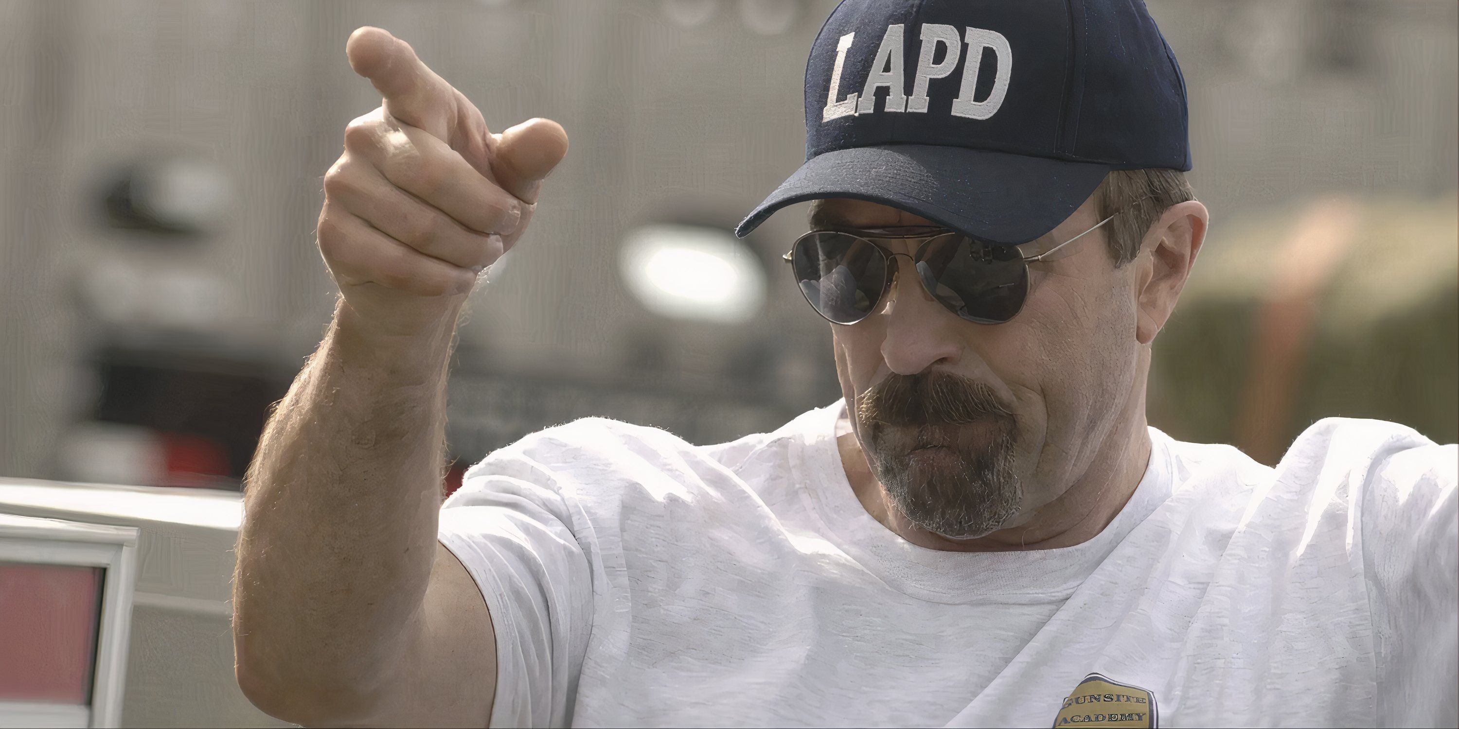 Jesse Stone (Tom Selleck) points upward in “Jesse Stone: Night Passage.”