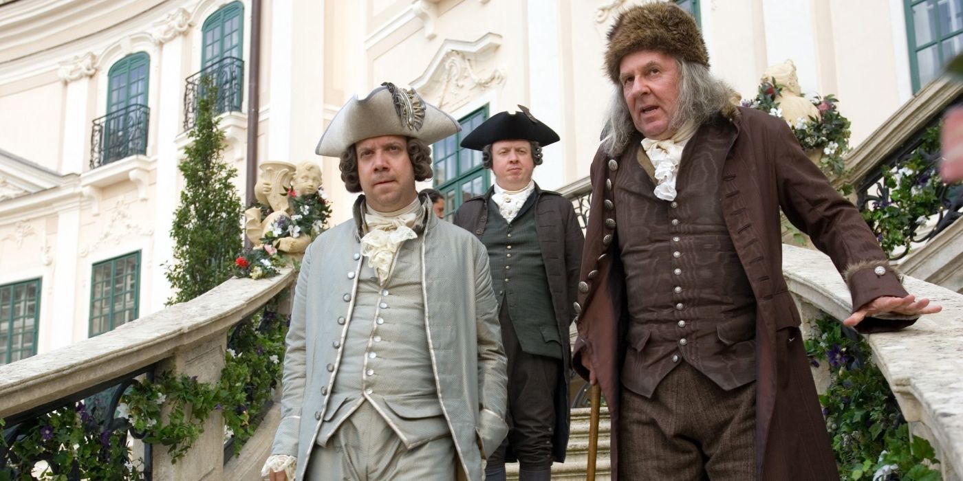 Paul Giamatti and Tom Wilkinson walking together in HBO's John Adams
