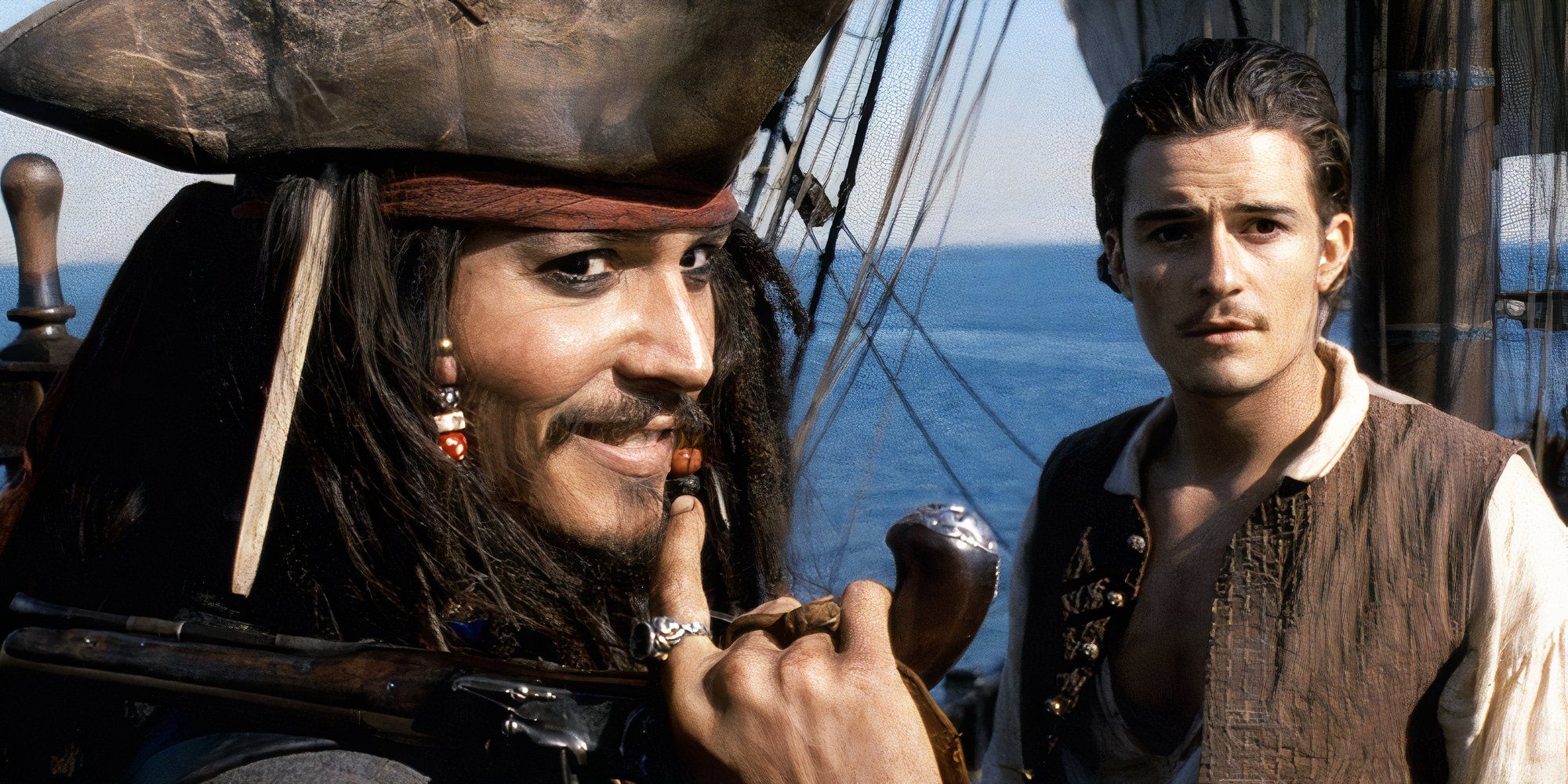 Johnny Depp as Jack Sparrow and Orlando Bloom as Will Turner in The Curse of the Black Pearl inside The Black Pearl