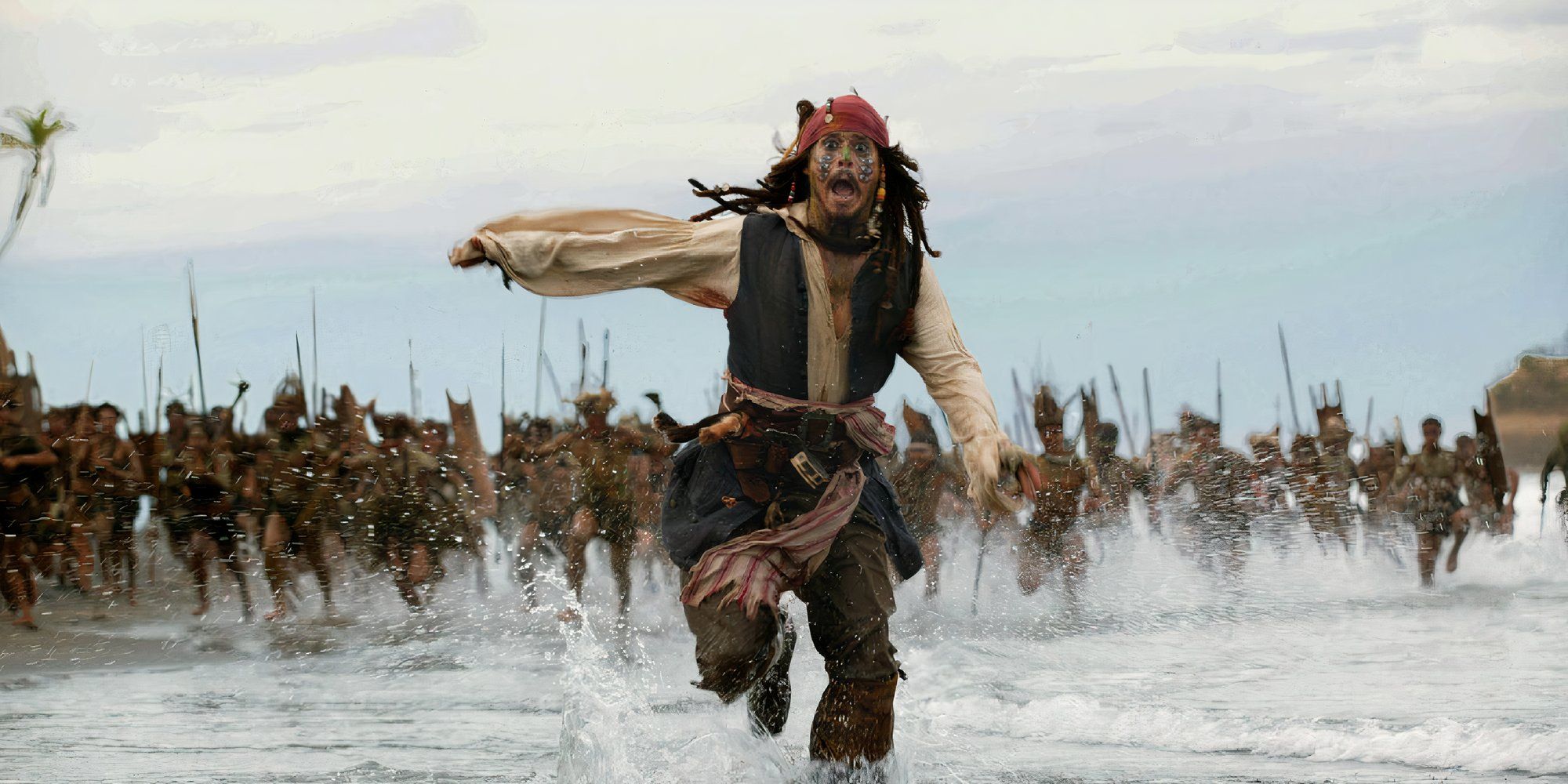 Johnny Depp as Jack Sparrow running away in Pirates of the Caribbean Dead Man's Chest