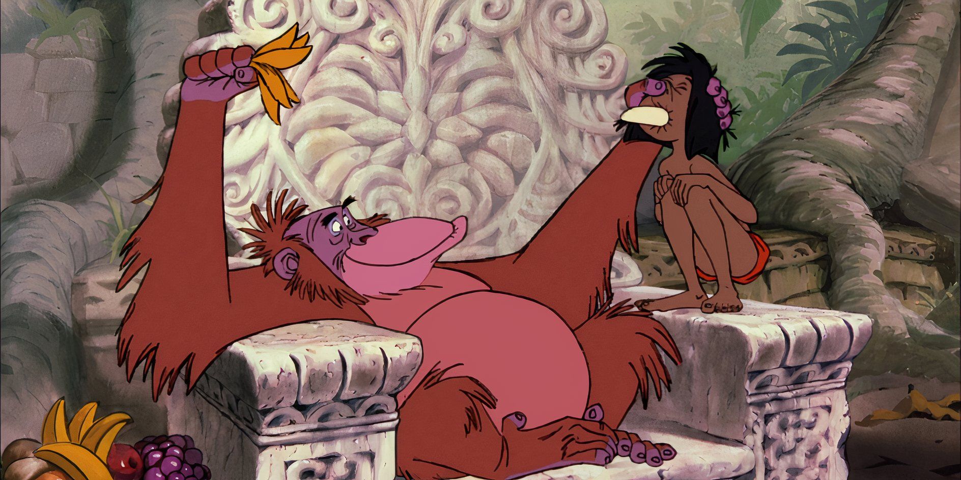 King Louie making Mowgli eat a banana while sitting on his throne in 'The Jungle Book'