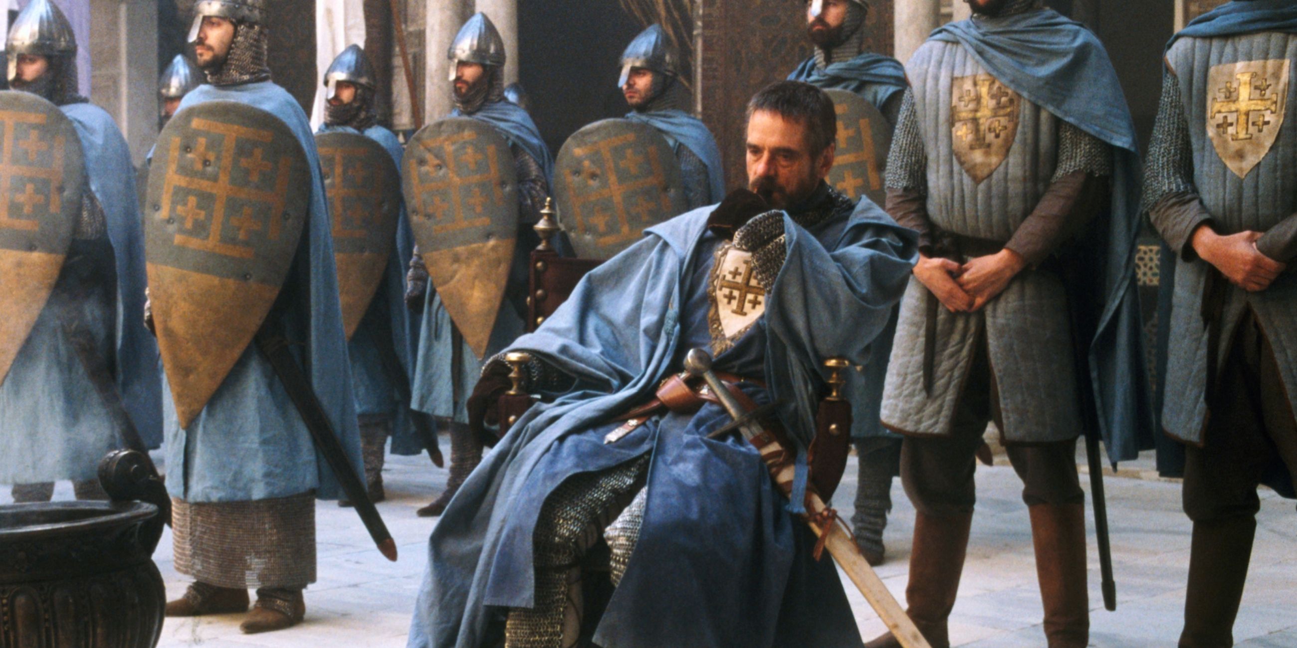 Jeremy Irons sitting down looking pensive in Kingdom of Heaven - 2005