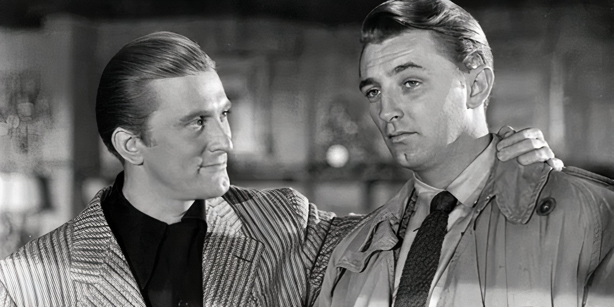 Kirk Douglas with his arm around Robert Mitchum's shoulder in Out of the Past (1947)