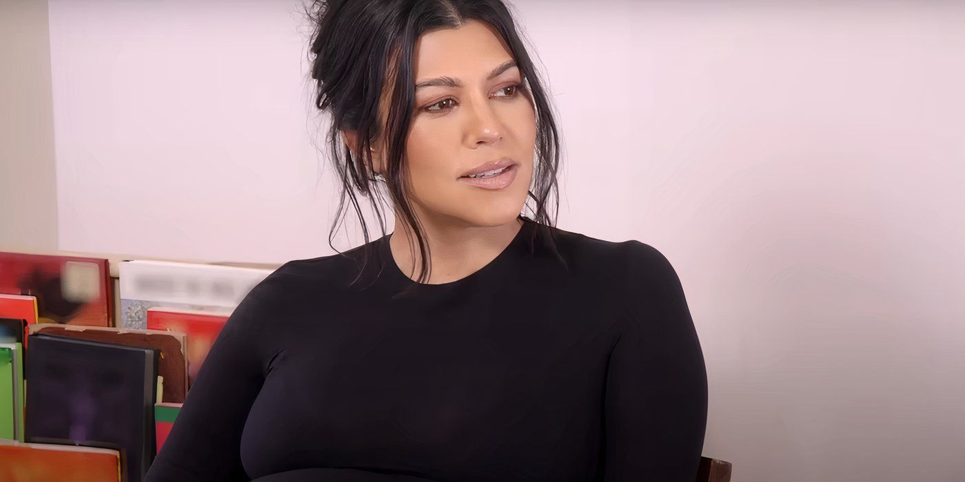 Kourtney Kardashian wearing a black dress in The Kardashians Season 5