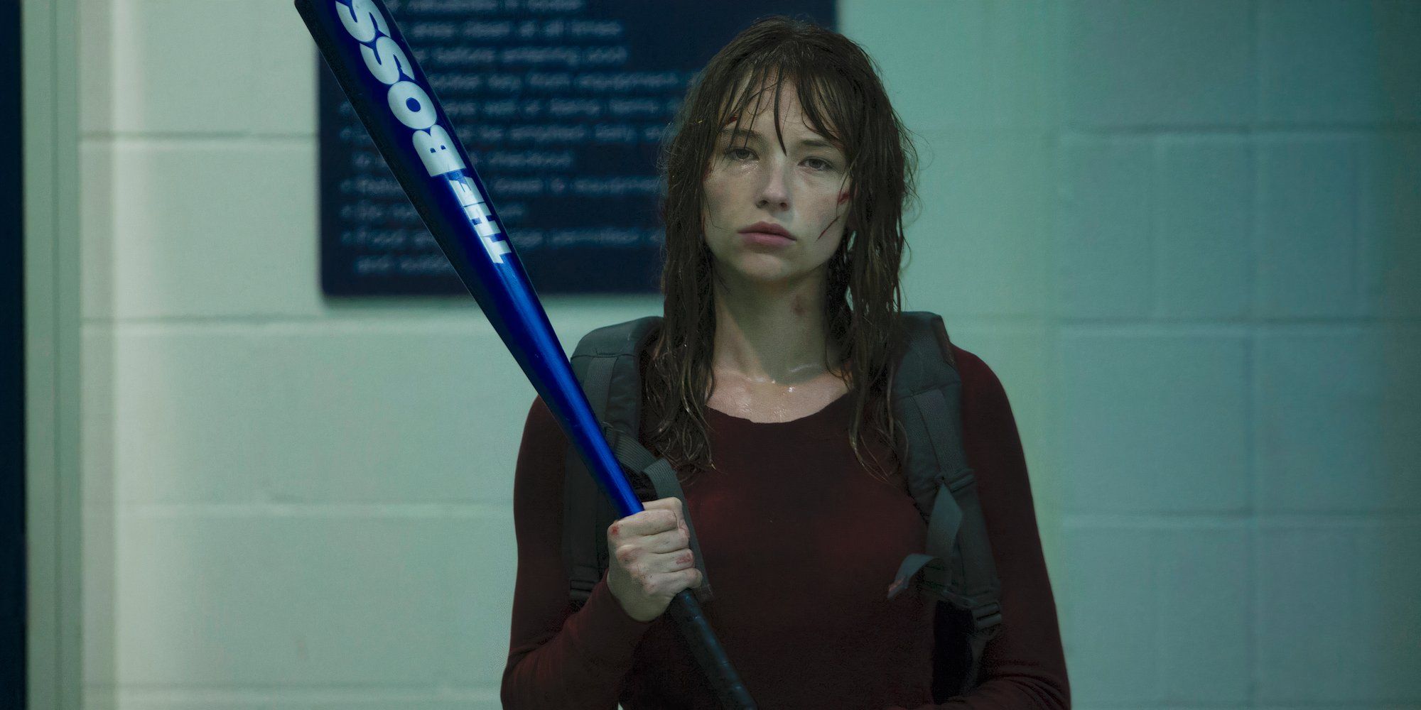 Haley Bennett holding a bat in Kristy