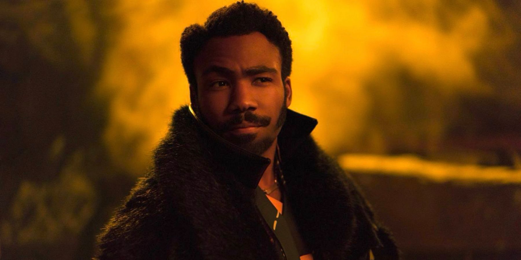 Lando Calrissian looks roguishly charming in the shipyard of Vandor in Solo: A Star Wars Story.