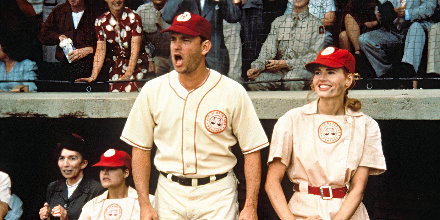 Jimmy Dugan (Tom Hanks) yells at a baseball game while Dottie Hinson (Genna Davis) smiles in A League of Their Own