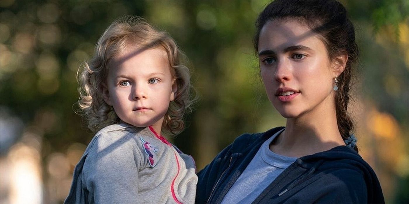 Margaret Qualley as Alex holding her daughter in the show Maid