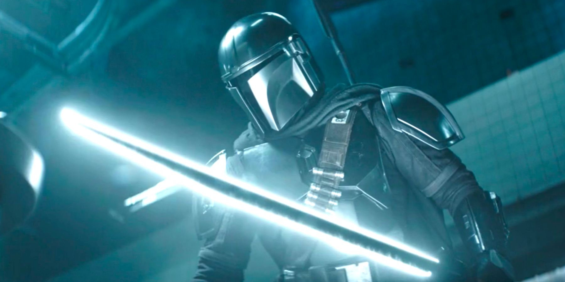 Din Djarin (Pedro Pascal), ignites the bright white blade of the Darksaber in The Book of Boba Fett.