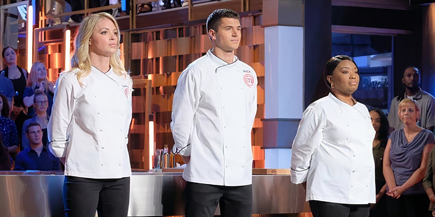 Three chefs standing in a row, arms behind their backs in Masterchef.