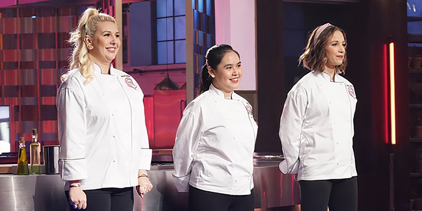 Three chefs from Masterchef standing wearing white jackets and smiling.