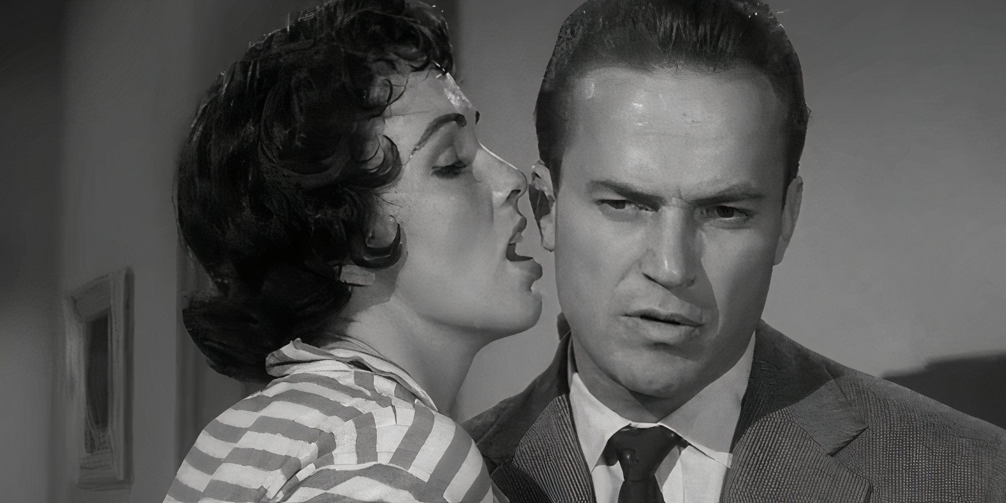 Maxine Cooper whispering in Ralph Meeker&rsquo;s ear in Kiss Me Deadly (1955)