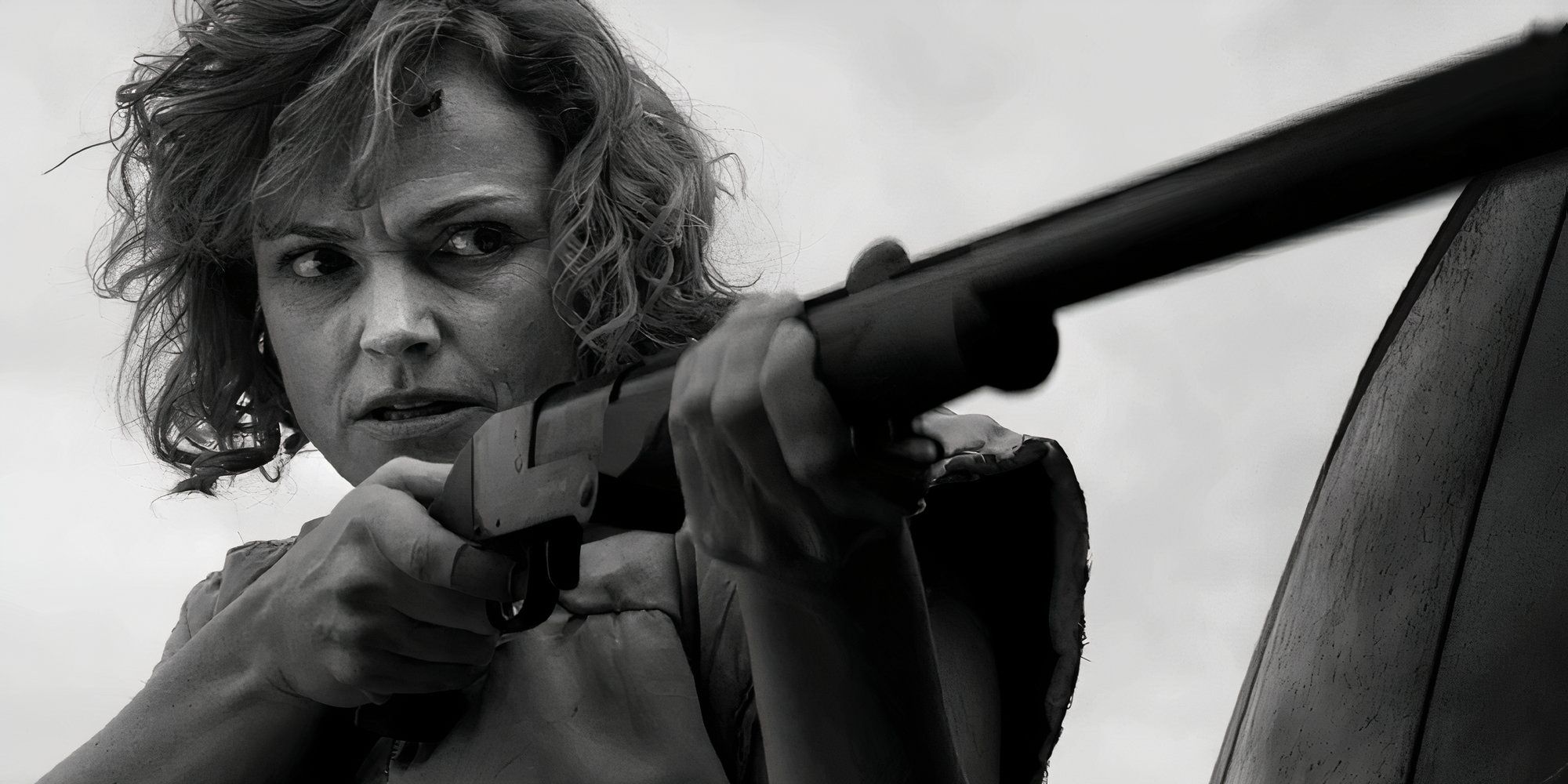 Maxine Peake as Bella holding a gun in Black Mirror's Metalhead.