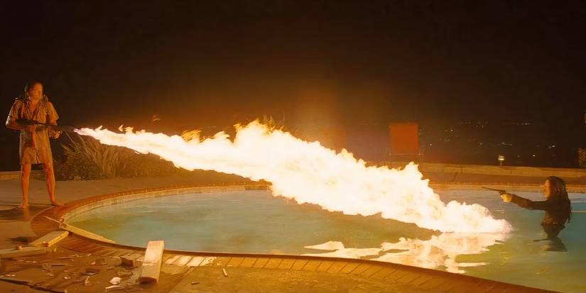 Leonardo Dicaprio blasts a flamethrower toward Mikey Madison in 'Once Upon a Time in Hollywood'