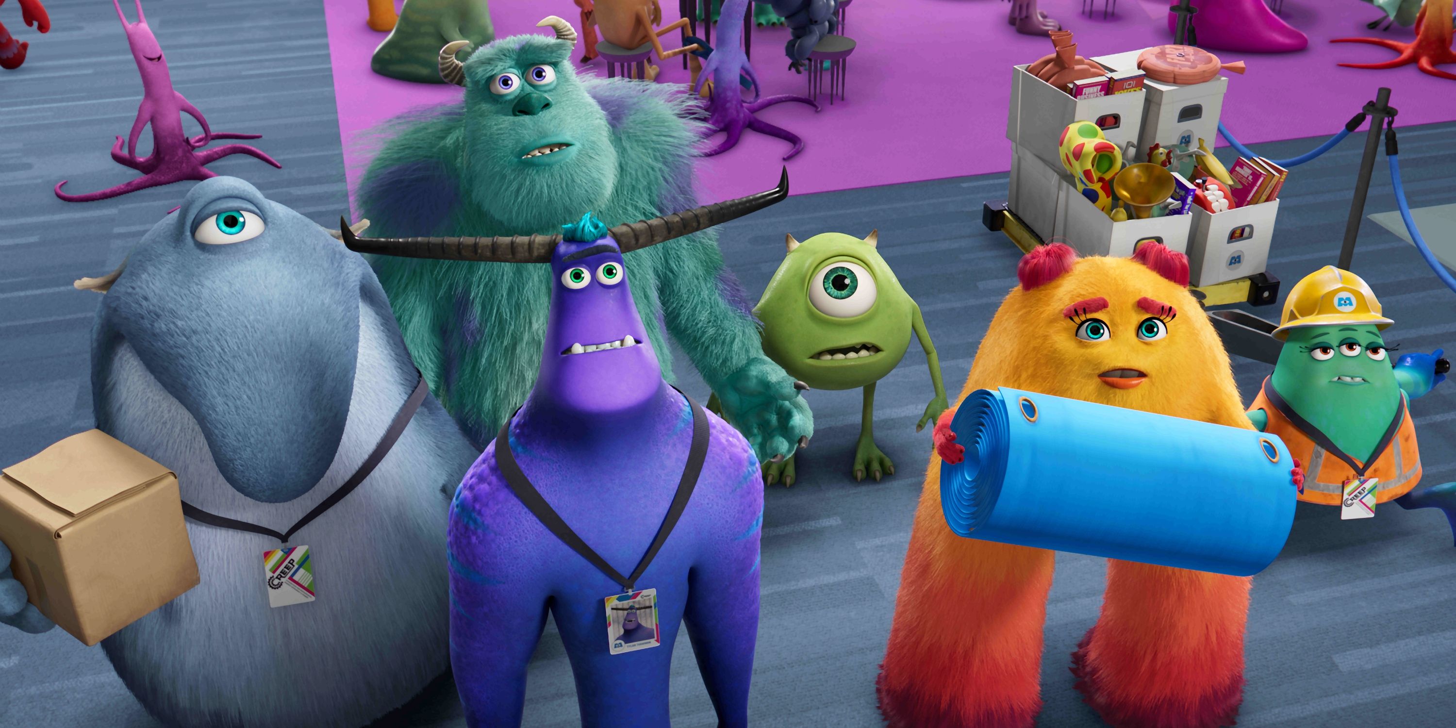 Mike Wazowski and Sulley standing with Tylor Tuskmon in Season 2 of Monsters at Work 