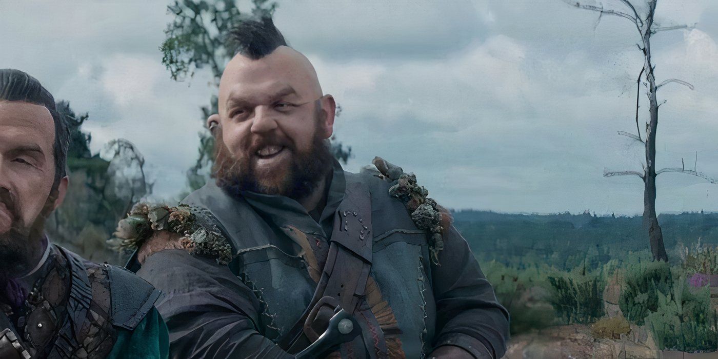 nick frost as Nion looking sideways and smiling in the huntsman: winter war
