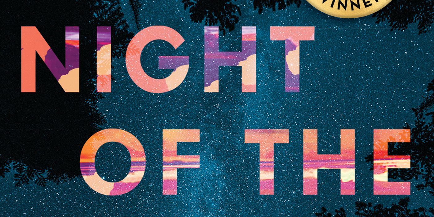 The words, "NIGHT OF THE..." are in orange, pink, and purple. In the background, there is a sky full of stars and outlines of tree tops.