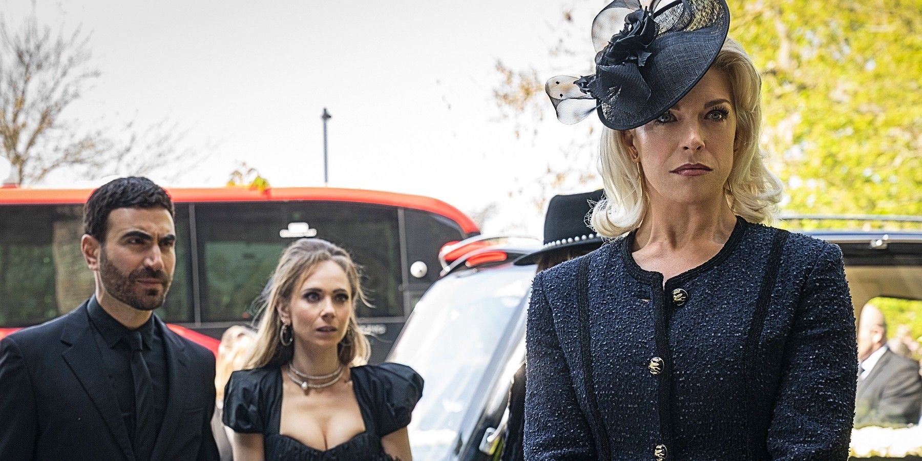 Roy Kent, Keeley Jones, and Rebecca Welton at Rebecca&rsquo;s father&rsquo;s funeral in Ted Lasso