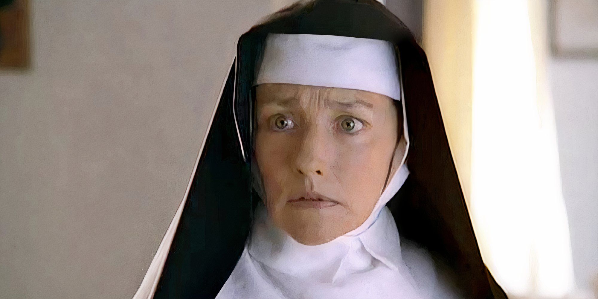 Olivia Hussey as Mother Teresa in Mother Teresa looking worried.