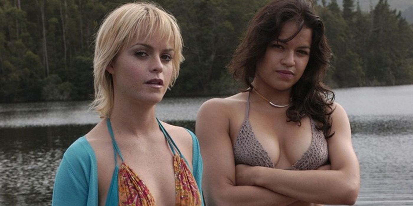 Michelle Rodriguez and Taryn Manning standing by a lake in The Breed