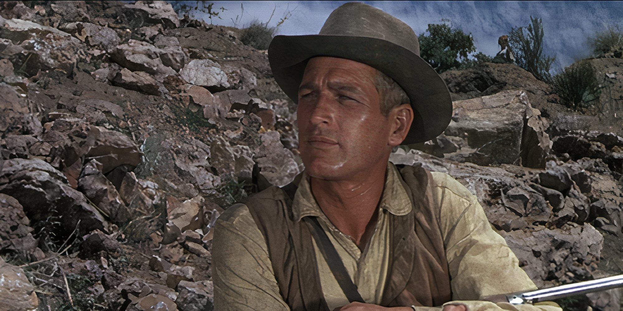 Paul Newman as John in Hombre holding a gun