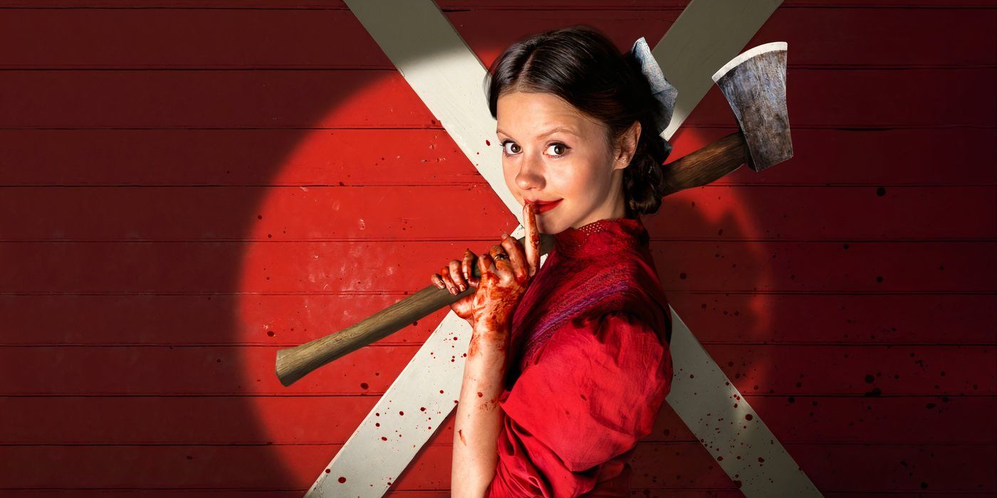 Pearl (Mia Goth) smiles with her bloodied fingers pressed to her lips and holds an axe as a spotlight shines on her