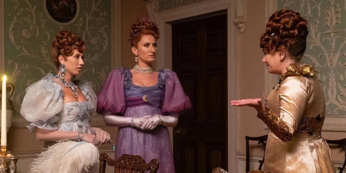 Philippa and Prudence standing in front of Portia during a scene at the ball in 'Bridgerton' Season 3