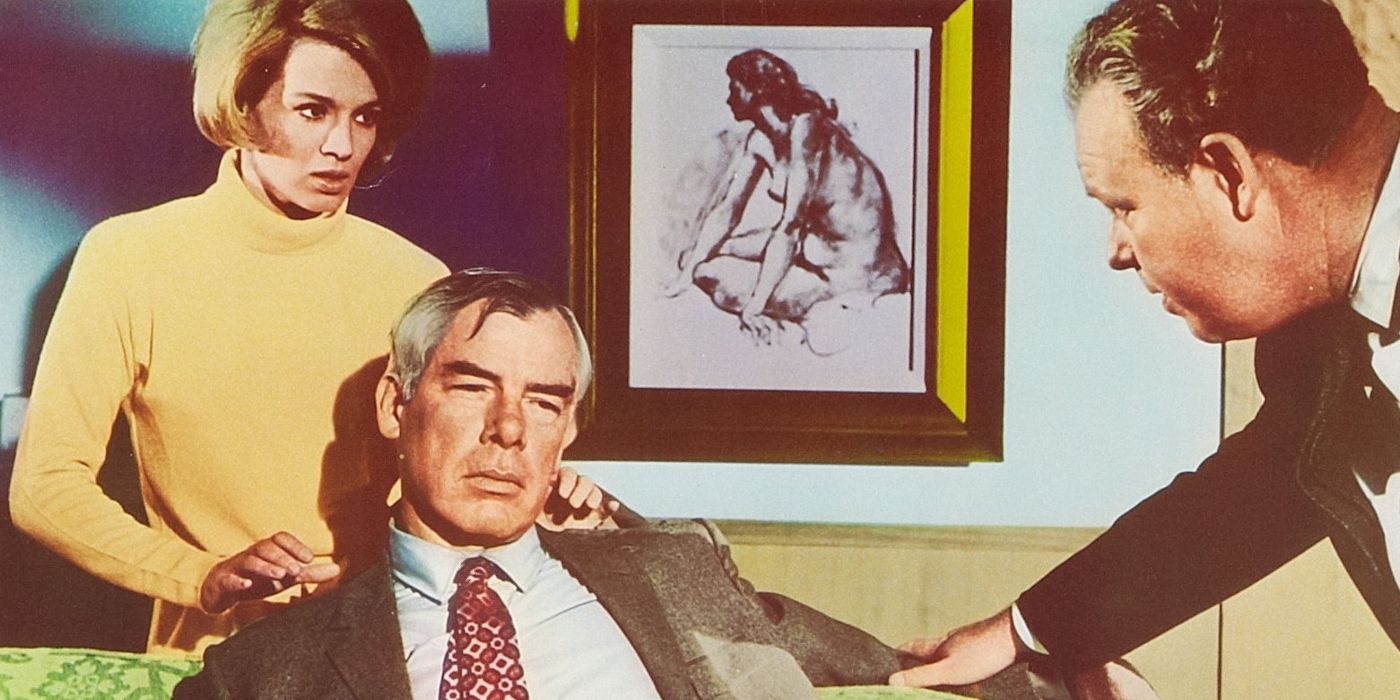 Lee Marvin as Walker, Angie Dickinson as Chris, and Carroll O'Connor as Brewster in Point Blank