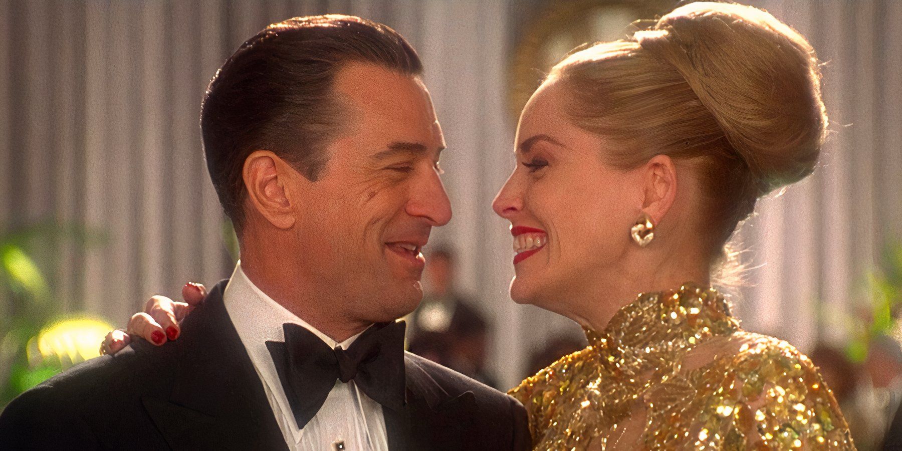 Sharply dressed Ace Rothstein laughs with his wife Ginger in Casino.