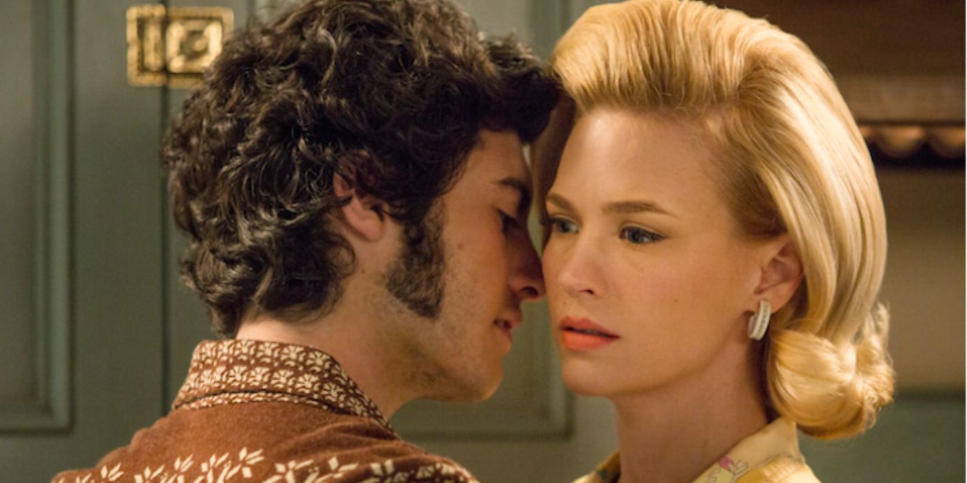 January Jones and Marten Weiner as glen leaning into Betty in 'Mad Men'